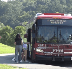 Students at the PVTA bus stop on the Mount Holyoke campus