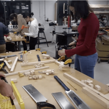 Students engaged in a wood block workshop in the Fimbel Lab
