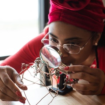 A student working on a wire project in the Fimbel Lab
