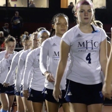Mount Holyoke College Field Hockey team lining up