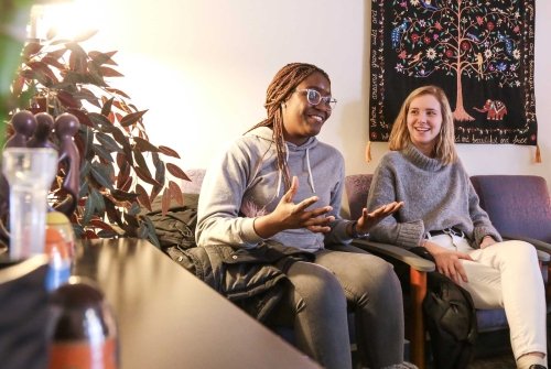 Two students engaged in a conversation