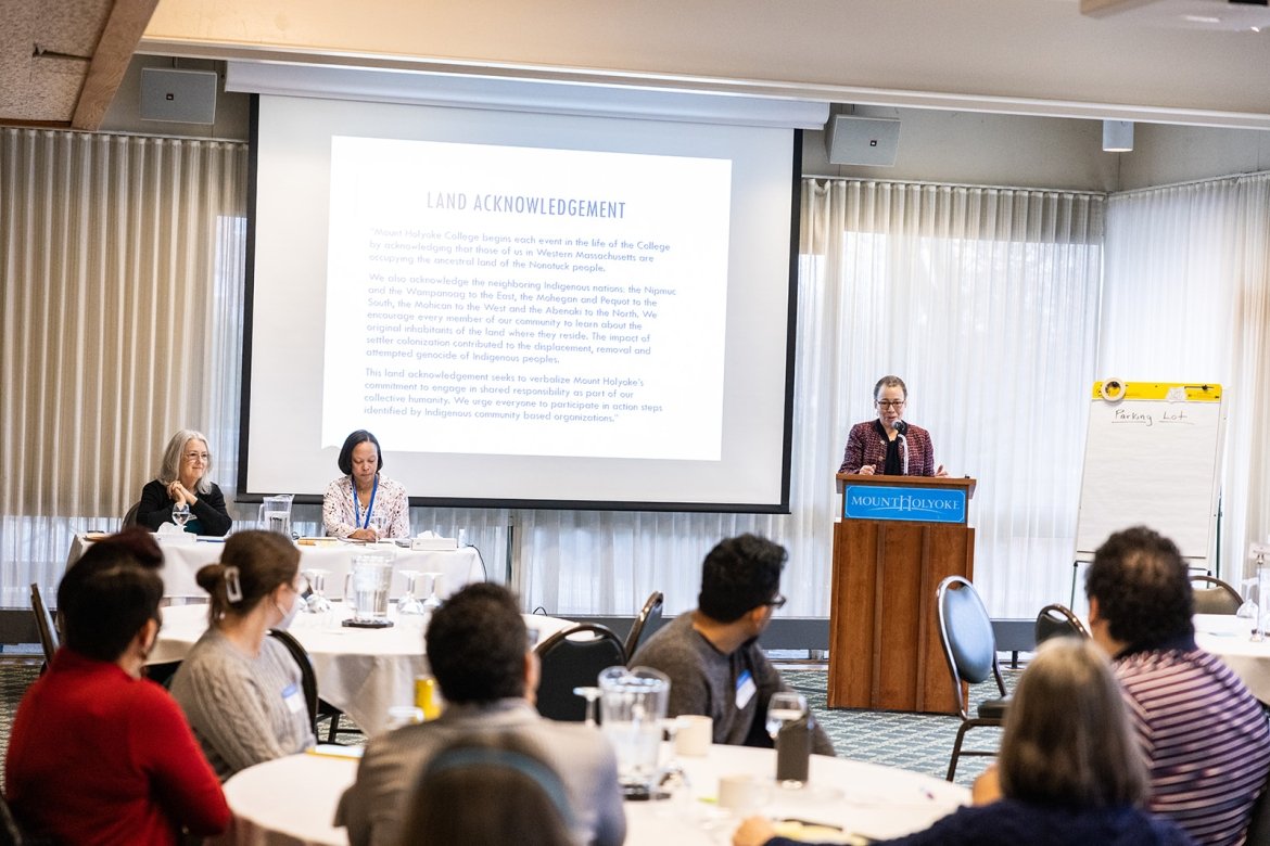 Dr. Beverly Daniel Tatum at the podium during an Intergroup Dialogue meeting for faculty and staff