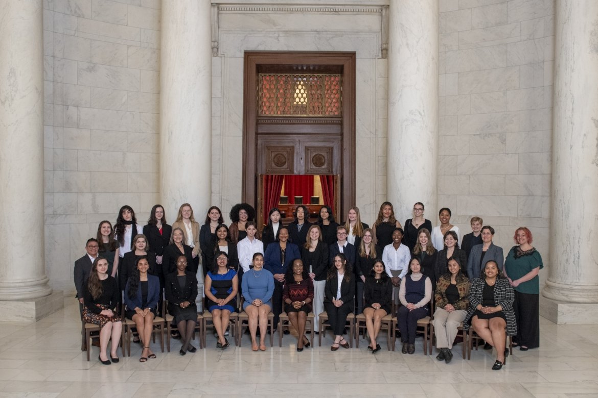 Supreme Court Justice Ketanji Brown Jackson (seated, center) with Mount Holyoke College students, faculty, staff and President Danielle Holley.