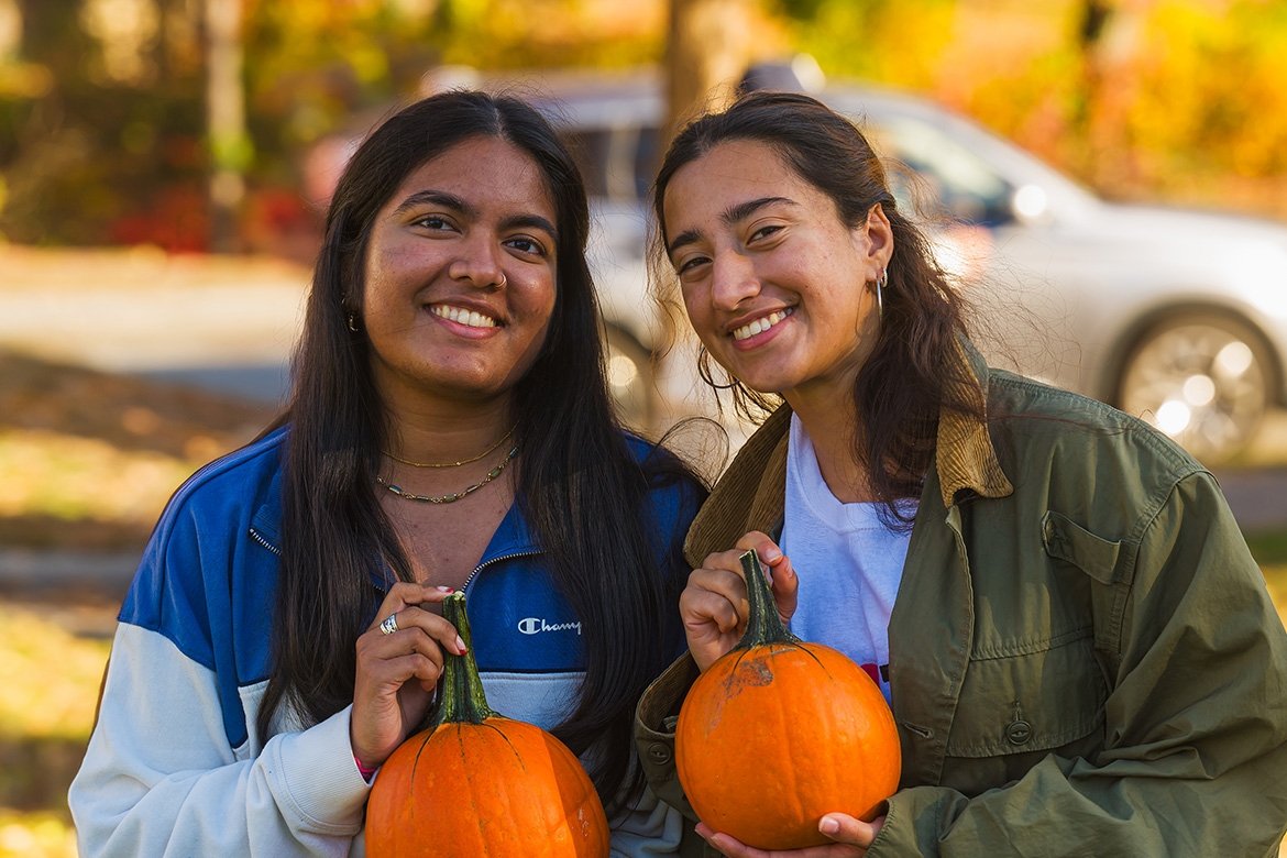 Students/Friends holding pumpkins at Mount Holyoke College Fall Fest