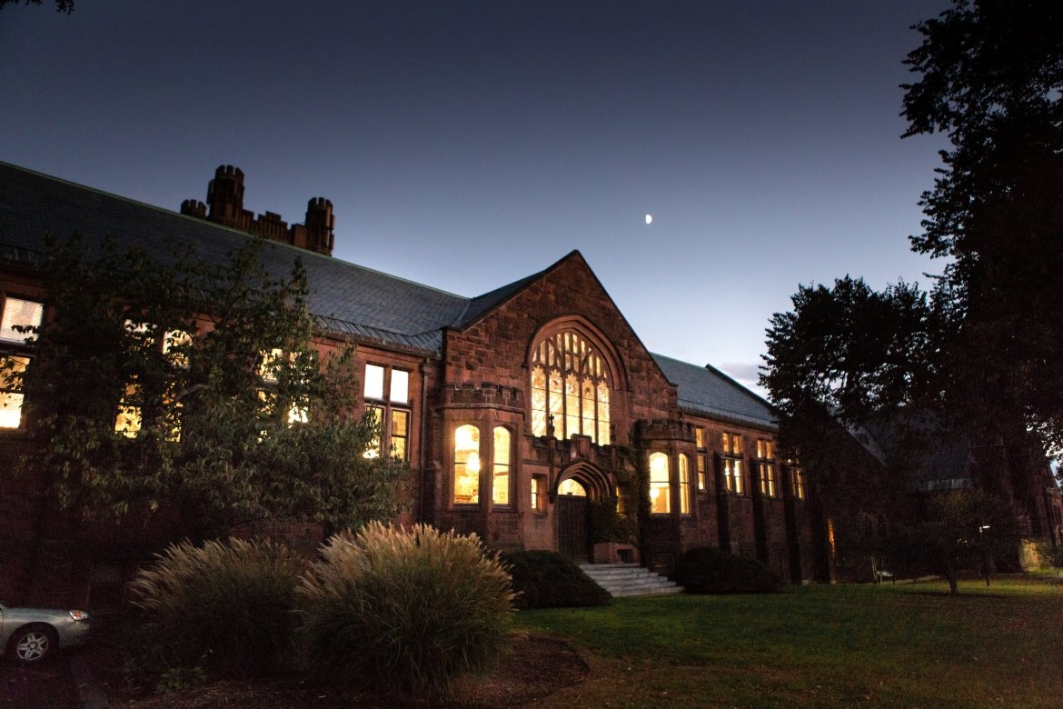 Mount Holyoke College Williston Library lit up from inside in 2024.