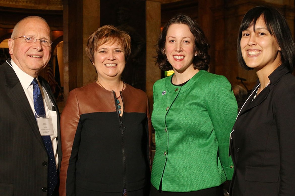 L-R: Representative John Scibak, President Lynn Pasquerella, Senator Kathleen O’Connor Ives ’99 and Becky Wai-Ling Packard.