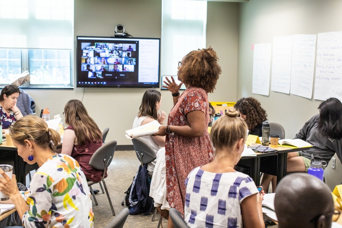 Graduate students attend classes both in-person and online. 