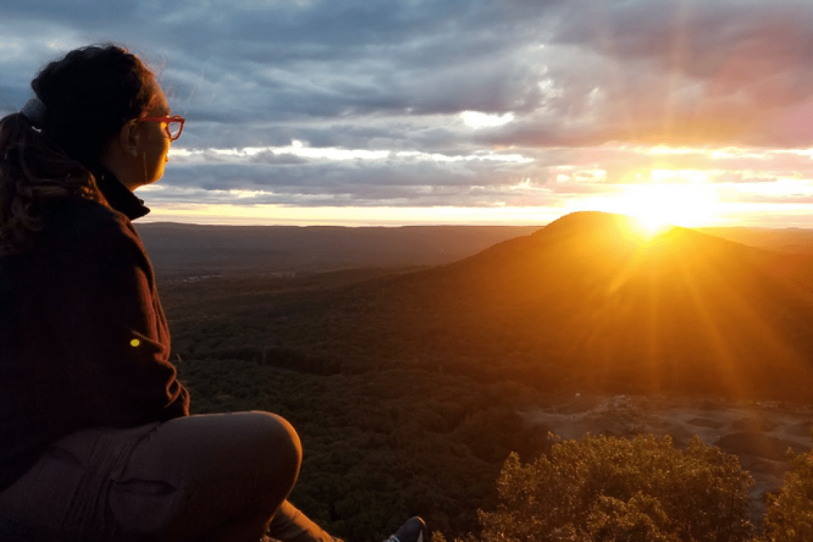 Sarah Paust ’20 atop Bare Mountain at sunrise