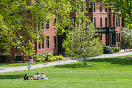Mount Holyoke students enjoying a spring day on Skinner Green