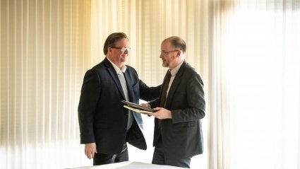 Jon Western congratulating James Harold at the Faculty Awards in 2020.