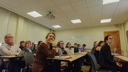 Audience watching a student presentation at LEAP 2018.