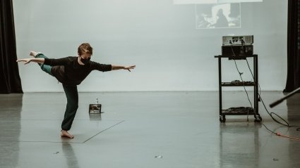 Barbie Diewald dances in a studio, alone apart from accompanist Peter Jones. Cameras set up at various angles show her movements.