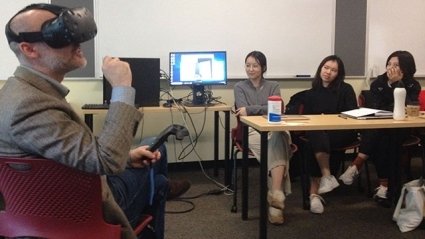 Nick Camerlenghi experiences architecture in virtual reality with students Hao Zhu ’20, Zhuosi He ’19 and Wenfei Jia ’19.