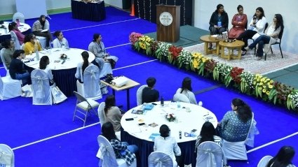 Shakti overview of tables and conference room with participants and leaders