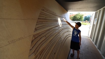 Solar Time - Oculus and milled birch wall