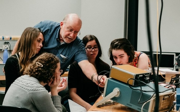 Students and a Professor in the Fimbel Maker & Innovation Lab