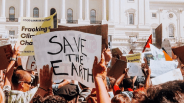 Save the Earth sign at the climate strike several MHC students attended.