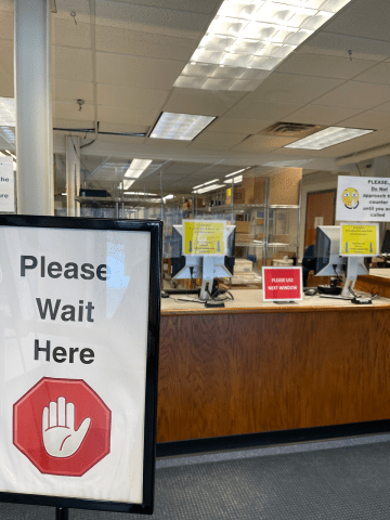 The please wait here sign in auxiliary services