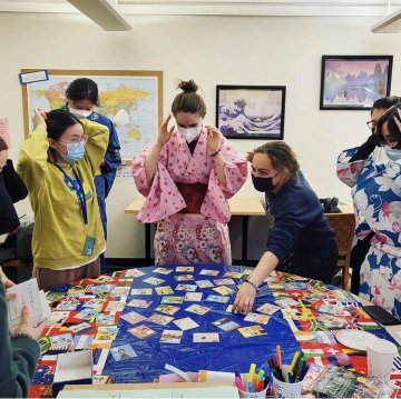 Students participating in an activity during the Language & Culture Commons open house