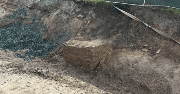 Abbey trench to the North exposing a brick used in the old building.